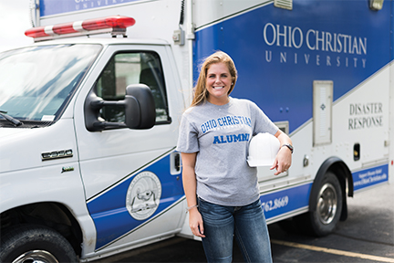 Image of Ohio Christian Student in front of emergency vehicle
